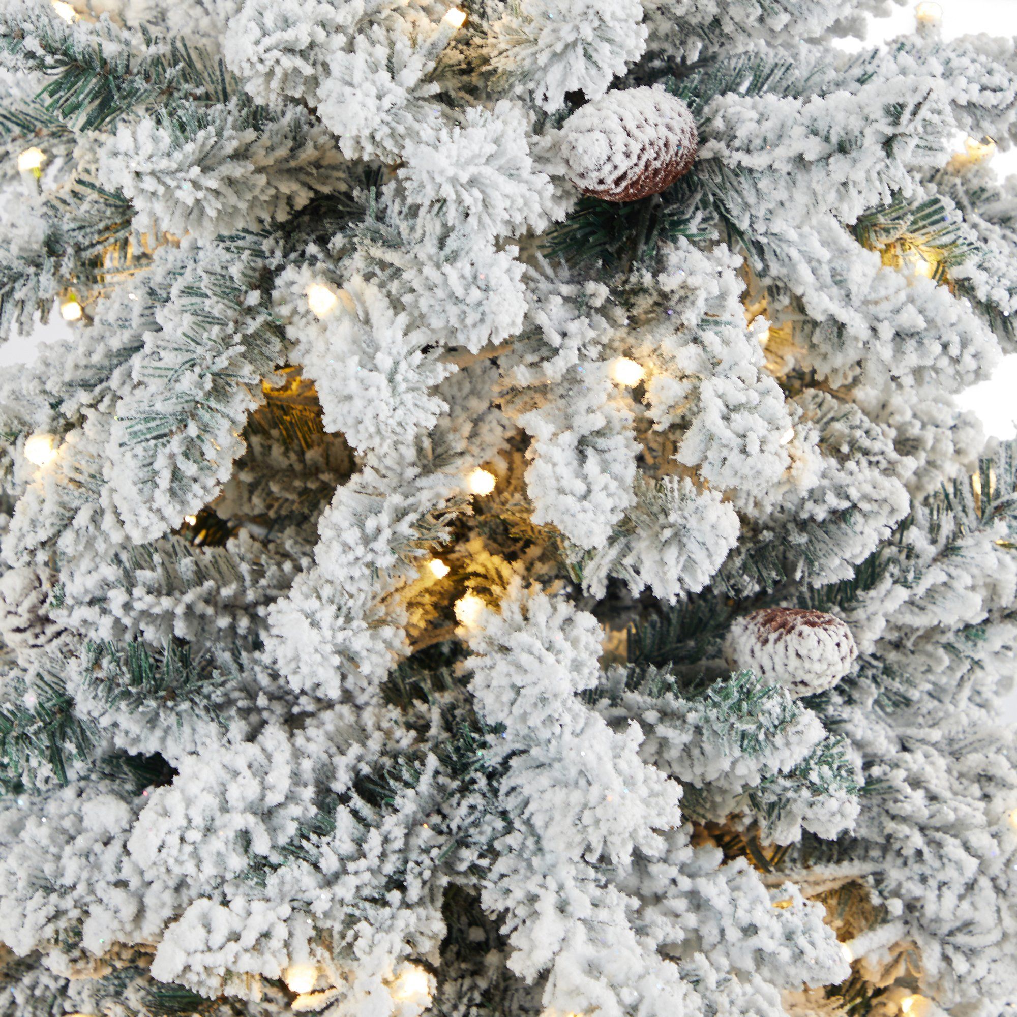 4.5’ Flocked Livingston Fir Artificial Christmas Tree with Pine Cones and 150 Clear Warm LED Lights in Charcoal Urn